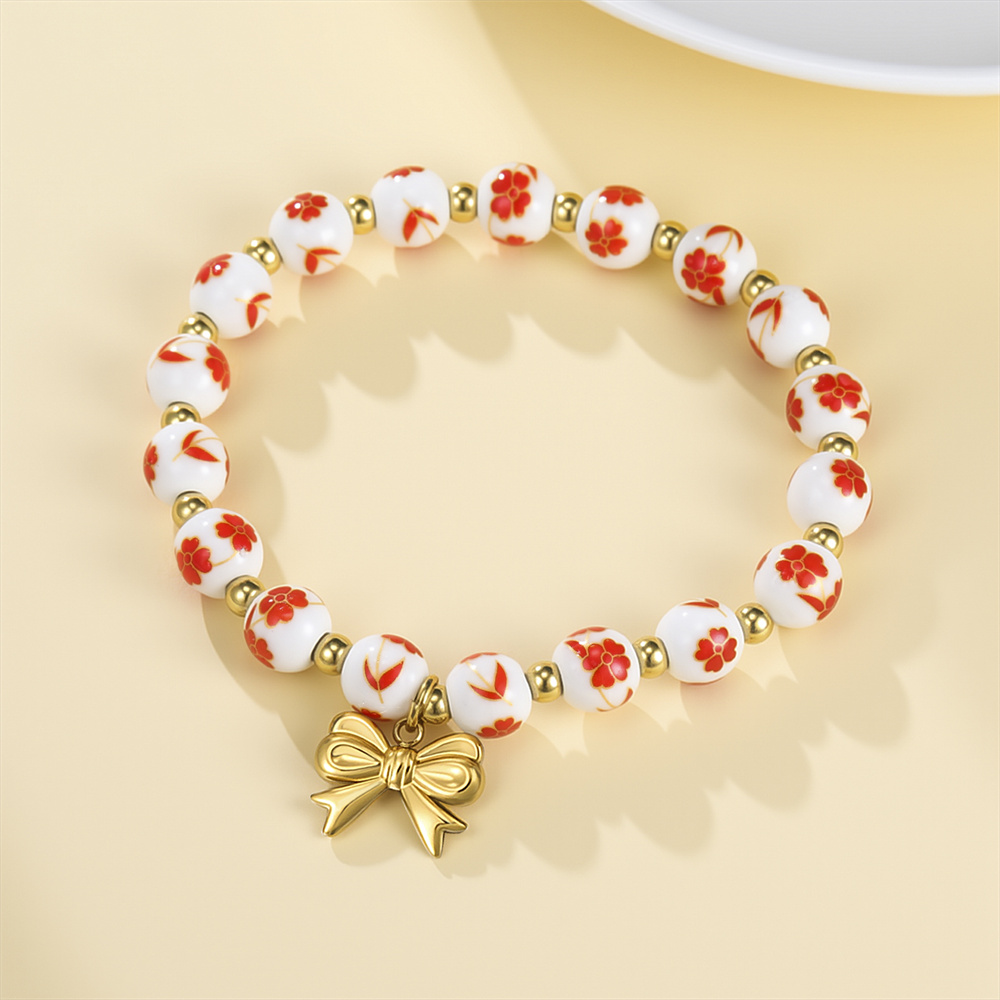 Ceramic Link Bracelet - สร้อยข้อมือลูกปัดเซรามิกสีสันสดใสสำหรับผู้หญิง ประดับโบว์ ลายดอกไม้สไตล์โบโฮ สร้อยข้อมือแบบซ้อนได้ ของขวัญเครื่องประดับ กันน้ำ